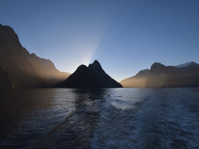 Stock photograph of mountains beside water