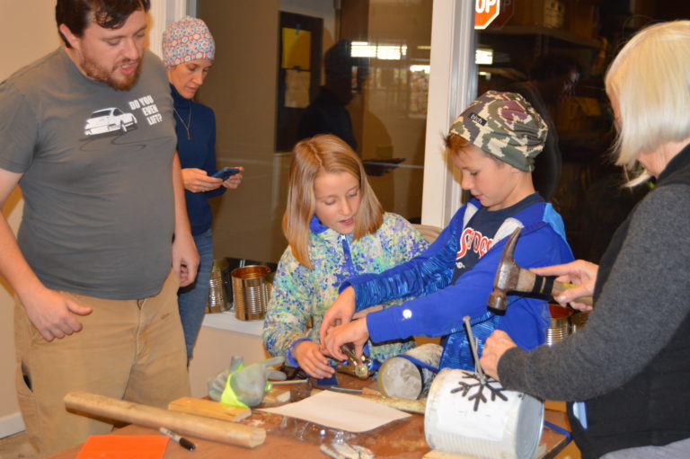 A group working together on a craft project
